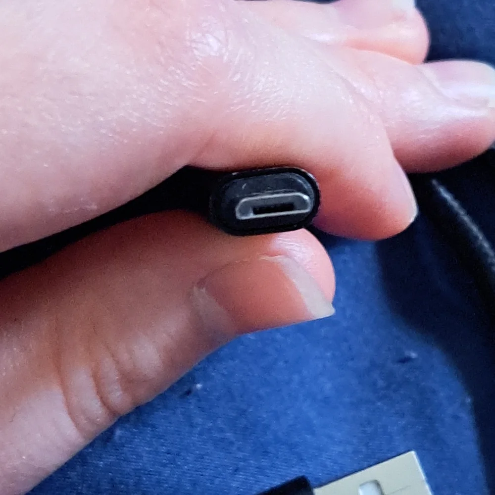 Used Black USB Charging Cable